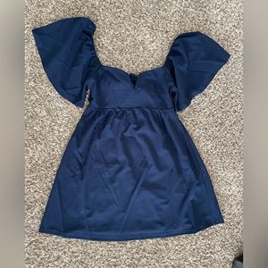 Francesca’s new Elsa swing dress in medium color navy blue